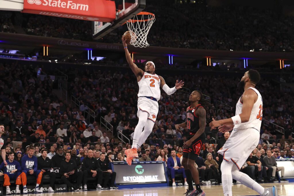 Short-handed Knicks need overtime to dodge Bulls